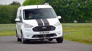 The door lock switch, lock and unlock the doors back and forth. Ford Transit Connect Van Review Auto Express