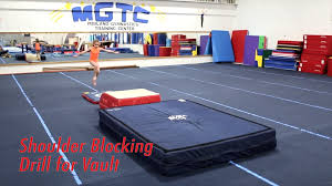 Shoulder Blocking Drill For Vault This Training Tip Shows The Increased Shoulder Action Needed For Gymnastics Skills Gymnastics Lessons Gymnastics Conditioning