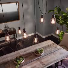 26 Bright Farmhouse Lighting Ideas You Dont Want To Miss With Photos Hayneedle In 2020 Kitchen Lighting Over Table Dining Table Lighting Lights Over Dining Table