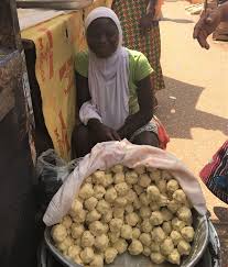 The Traditional Way Women Hand Roll Shea Balls And Put A Basin On Their Head To Carry It To The Market Walking Shea Butter Dog Food Recipes Raw Shea Butter