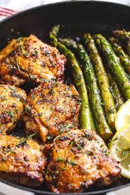 Buttery Garlic Herb Chicken With Asparagus This Nourishing Chicken And Asparagus Skillet Is An Easy Way T Healthy Recipes Chicken Recipes Garlic Herb Chicken