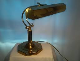 They are generally called sconce types, if they mount to the wall. Vintage Underwriters Laboratories Brass Portable Desk Lamp Table Bankers Piano Lamp Desk Lamp Table Lamp