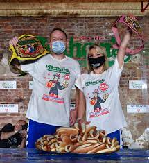 And how many dogs will the winners consume? Chestnut Sudo Stay Red Hot By Winning Nathan S Hot Dog Contest In Record Breaking Style Amnewyork