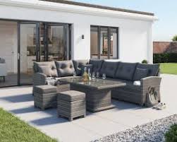 This stylish, height adjustable table has an elm top, and you can choose from a black or gunmetal base. Grey Large Rattan Garden Corner Sofa Dining Set With Adjustable Table Sorrento Range Rattan Direct