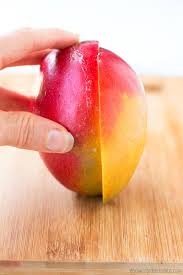 Then use a large spoon to scoop out the flesh and transfer it to a bowl to slice. How To Cut A Mango The Best Method With Easiest Step By Step Photos