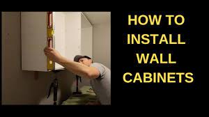 Storage solutions, easy diys and organizing tips that make doing. How To Install Wall Cabinets In A Laundry Room Youtube