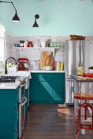 The white countertop and island bring the kitchen together, evening out the vibrant colors. 25 Best Kitchen Paint And Wall Colors Ideas For Popular Kitchen Color Schemes 201