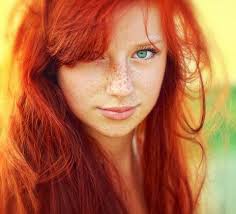 Are hazel or green eyes more common in red-haired people?