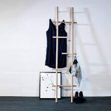 Building a simple, stylish clothing rack from pipe: Wooden Lendra Ladder By Kommod Connox Shop
