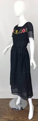 Check out our red roses dresses selection for the very best in unique or custom, handmade pieces from our dresses shops. 1970s Black Embroidered Crochet Flowers Vintage 70s Mexican Maxi Dress For Sale At 1stdibs