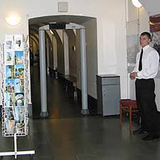 Passing through a metal detector. Ceia Security Metal Detectors