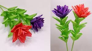 The great thing about paper flower crafts, is that with a little bit of resourcefulness and creativity, you can incorporate them into your wedding day for free, using newspaper, vintage books, paper bags, and scrap paper. Paper Flowers Paper Stick Flower Idea For Home Decoration Easy Handcraft Abigail Paper Crafts Paper Flowers Crafts Paper Flower Tutorial