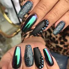 The blue nail art is framed by a line of silver glitter polish all over the nails making it look uniform and interesting to see. Dark Nail Color Designs You Will Love