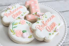 Baby First Birthday Decorated Sugar Cookies Featuring A Pink Number One With White Polka Dots And First Birthday Cookies Baby Girl Birthday Birthday Cookies