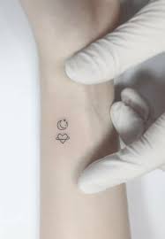 Tiny wrist tattoos wrist tattoos for women little tattoos mini tattoos small tattoos saturn tattoo astronomy tattoo hair tattoos tatoos. Tiny Tattoo Idea The Sweetest Icon Wrist Tattoos Tattooviral Com Your Number One Source For Daily Tattoo Designs Ideas Inspiration