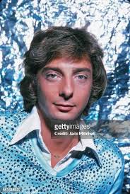 It's 1975, and for the 3rd morning in a row, "Mandy" is the first song  blasting out of the clock radio. My foam curlers have mostly fallen out  over night, but I'm