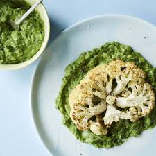 Roasted Cauliflower Steak With Avocado Kale Vegan Pesto Solluna By Kimberly Snyder Recipe Cauliflower Steaks Roasted Cauliflower Roasted Cauliflower Steaks