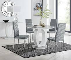 I received this dining table and chairs yesterday and despite my husband and i having painful arthritis we managed the'building'of the furniture over several hours&several rests i really love it a good table fits 4 chairs. Grey White Round Gloss Dining Table 4 Milan Chairs Furniturebox