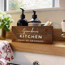 This sink caddy provides space for keeping your dish soap and a dish brush. Personalised Kitchen Sink Tidy Delightful Living