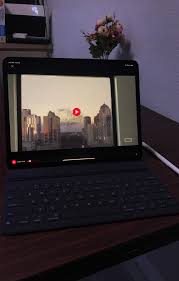 Is There Anyway To Hide The White Bar While Watching Video Through Safari Ipad