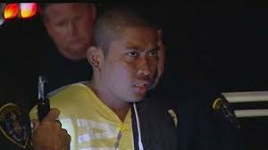 Murder suspect's family stands by him