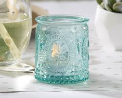 This tall glass candle vases is very beatiful with embossed design. Vintage Blue Glass Fleur De Lis Tealight Holders Set Of 4