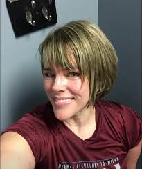 People ask me how I went from color to silver. I cut it short and let it  grow out. It took a year. It's empowering! I love it.