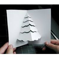 Cut a small brown rectangle and glue it in the card, in the middle of the fold, to make the tree trunk. Christmas Tree Pop Up Card