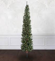 Pencil Fir Skinny Christmas Tree Pre Lit Christmas Tree Christmas Tree On Table