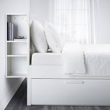 No headboard, it's basically a rectangular prism chock full of drawers. Brimnes Bed Frame With Storage Headboard White Ikea