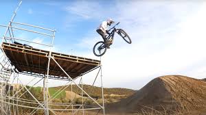 Pro Freeride Mountian Biker and Olympic Motocross Rider Shred the Slayground  - BikeMag