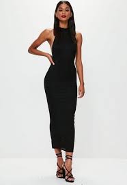 Black Dress With A High Neck Low Back And In A Maxi Length Women Dress Online Long Dresses Online Black Tie Dress