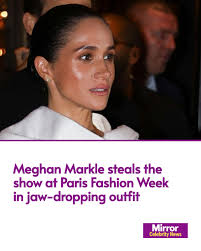 Meghan Markle turned heads in Paris as she made a surprise appearance at  Fashion Week, marking her first-ever attendance at the prestigious event.