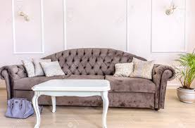 The living room is the social hub of your home, it should be unique and comfortable, reflecting your family style. White Apartment Interior Design Living Room With Classic Furniture Sofa And White Table Flower And Tv Audio Set Modern Style In Chisinau Cenral District Moldova Stock Photo Picture And Royalty Free Image