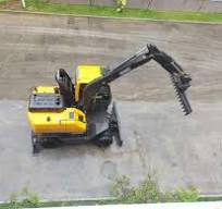7.6 Tons Wheel Type Excavator With Material Leveling Machine ...