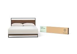 A handcrafted wooden bed will add a feeling of warmth in any home. The Chicago Athenaeum Ironline Platform Bed 2017