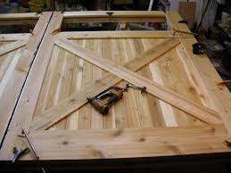 Build carriage doors for garage. Tips And Instructions For Building A Superior Overhead Garage Door