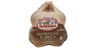 What is the probability that a randomly selected turkey produced at the farm will have a weight of at least 10.2 kg? Brined Turkey Bell Evans