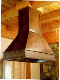 These hoods are placed directly over the kitchen range and can vary in length depending on the height of the ceiling. Kitchen Island Copper Range Hood
