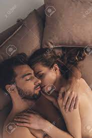 Sexy Young Naked Couple Sleeping Together In Bed Stock Photo, Picture and  Royalty Free Image. Image 93620427.