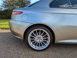 Image result for Grigio Travertino 2005 Alfa-Romeo