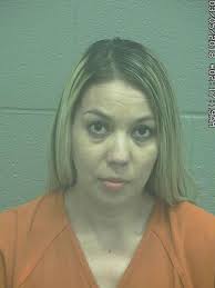 Woman allegedly hits man with car