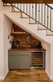 When located near the entryway to the home, cabinets can be used to store shoes or jackets in an easily accessible area. Home Bar Designs Under Stairs