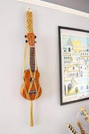 Check spelling or type a new query. Macrame Ukulele Wall Hanger Ukulele Stand Guitar Wall Decor Etsy In 2021 Wall Hanger Guitar Wall Ukulele Stand