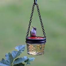 A hummingbird feeder is a delight for any garden space. 16 Diy Homemade Hummingbird Feeder Ideas To Attract Them To Your Home Humming Bird Feeders Homemade Hummingbird Feeder Bird Feeders