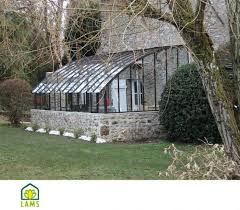 Serre Adossee En Verre Trempe 4mm Et Aluminium Lams Chambord Sur Muret Serre Adossee Maison Verte Serre Jardin