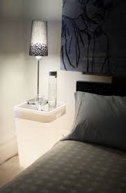 It has high gloss white finish and stainless steel legs. Modern Nightstands Functional And Decorative Bedroom Furniture