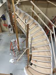 The curved stairs on this deck are about as challenging to frame as stairs can get, but the finished product looks great and provides overflow seating. Curved Plywood Stair Stringer Structural Engineering General Discussion Eng Tips