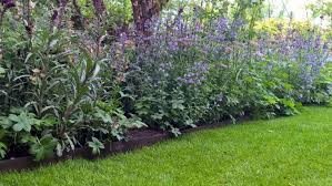 It can easily be cut with a saw to desired size. Landscaping 101 Lawn Edging Gardenista