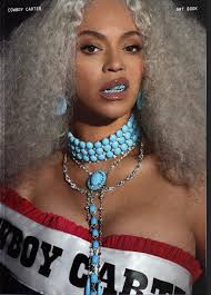 Beyoncé sports a grill